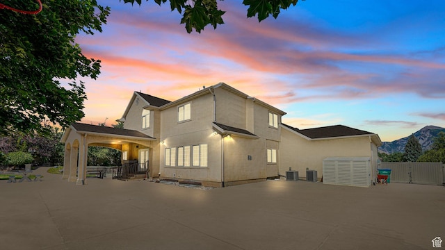 11597 N Sunset Hills Dr, Highland, UT 84003 - back of house featuring a gate, a patio, and stucco siding