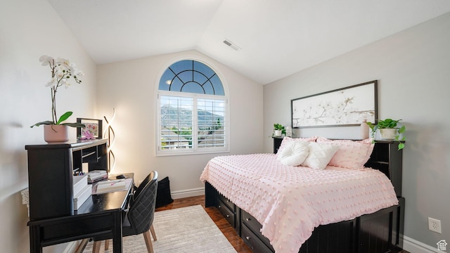 11597 N Sunset Hills Dr, Highland, UT 84003 - bedroom featuring dark wood finished floors and vaulted ceiling