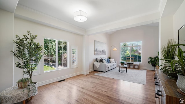 11597 N Sunset Hills Dr, Highland, UT 84003 - living room featuring wood finished floors, healthy amount of natural light, and crown molding