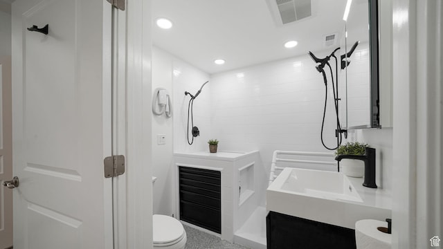 11597 N Sunset Hills Dr, Highland, UT 84003 - bathroom with a shower, recessed lighting, vanity, and tile walls