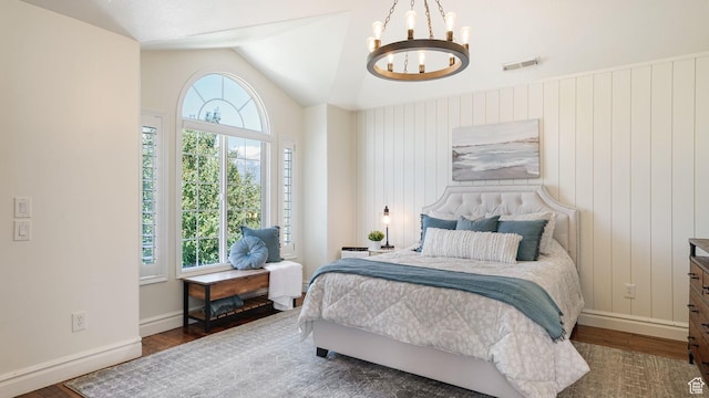 11597 N Sunset Hills Dr, Highland, UT 84003 - bedroom featuring a chandelier, wood finished floors, and lofted ceiling