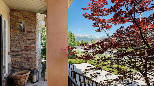 11597 N Sunset Hills Dr, Highland, UT 84003 - covered porch with a mountain view