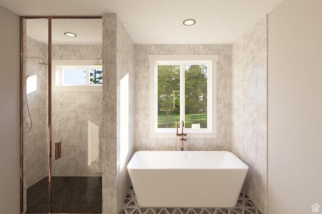 6158 W Silver Sky Dr W Unit 102, Herriman, UT 84096 - full bath with plenty of natural light, a freestanding bath, tile walls, and a marble finish shower