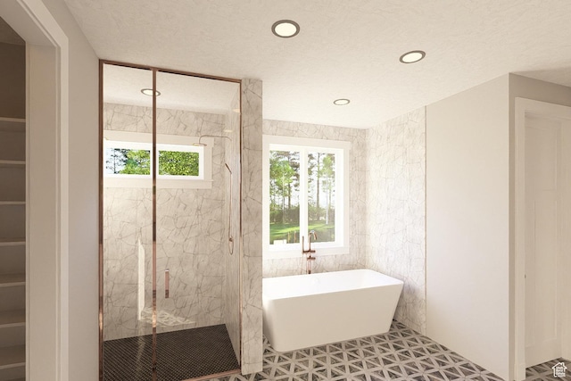 6158 W Silver Sky Dr W Unit 102, Herriman, UT 84096 - full bath featuring a soaking tub, a marble finish shower, recessed lighting, and tile walls
