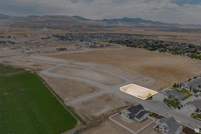 6158 W Silver Sky Dr W Unit 102, Herriman, UT 84096 - aerial view of property and surrounding area featuring property parcel outlined, rural landscape, and nearby suburban area
