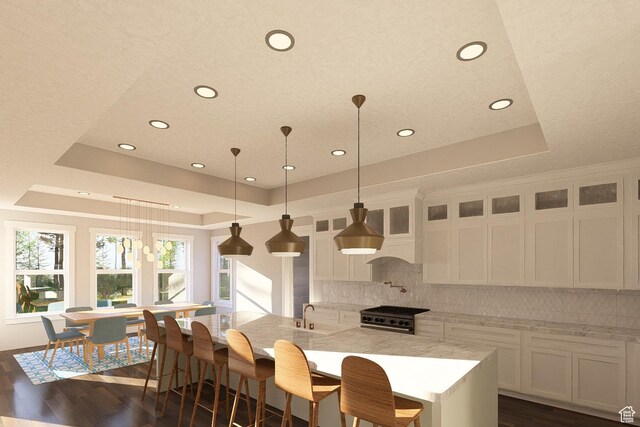 6158 W Silver Sky Dr W Unit 102, Herriman, UT 84096 - kitchen with a raised ceiling, high end stainless steel range, recessed lighting, and backsplash