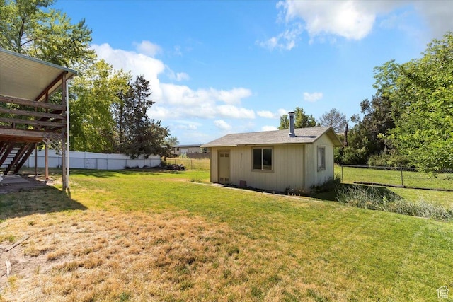 2989 W 700 S, Syracuse, UT 84075 - fenced backyard with stairway, an outbuilding, and a wooden deck