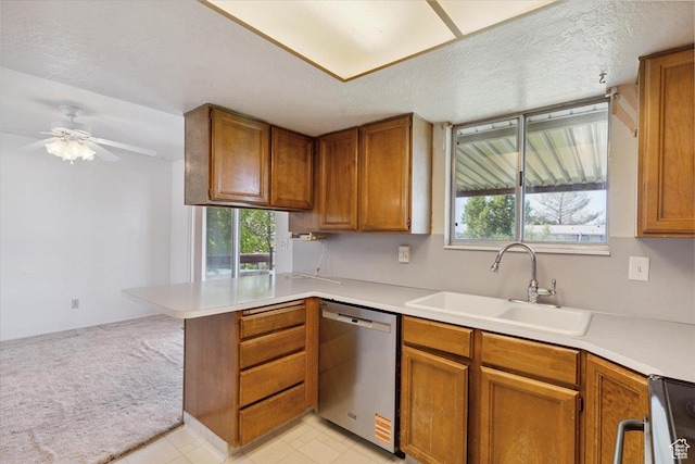 2989 W 700 S, Syracuse, UT 84075 - kitchen featuring dishwasher, a peninsula, and brown cabinetry