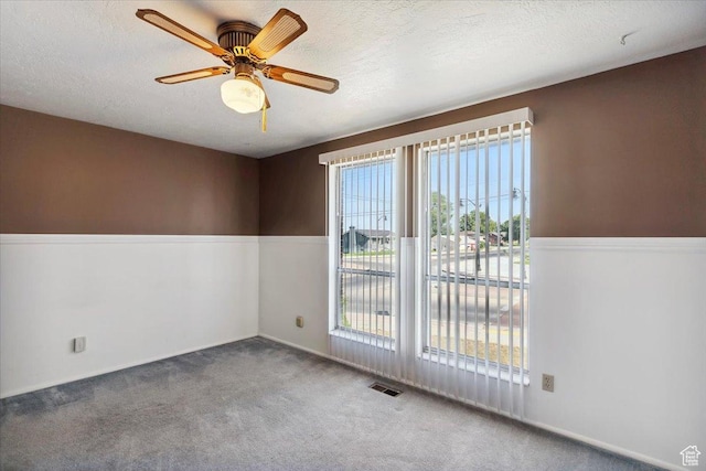 2989 W 700 S, Syracuse, UT 84075 - carpeted spare room featuring ceiling fan and a textured ceiling