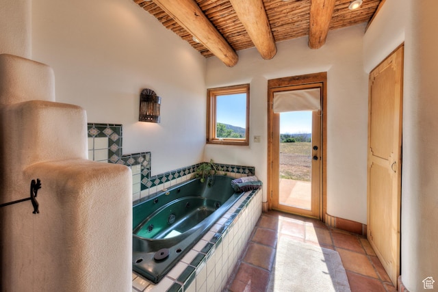 70 Desert Solitaire Rd, Moab, UT 84532 - full bathroom with a wood ceiling with exposed beams, a tub with jets, and tile patterned floors