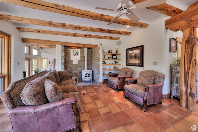 70 Desert Solitaire Rd, Moab, UT 84532 - living area featuring a wood stove, ceiling fan, and beam ceiling