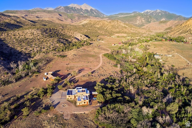 70 Desert Solitaire Rd, Moab, UT 84532 - aerial overview of property's location with mountains
