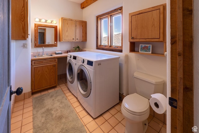 70 Desert Solitaire Rd, Moab, UT 84532 - laundry area with washing machine and dryer and light tile patterned floors