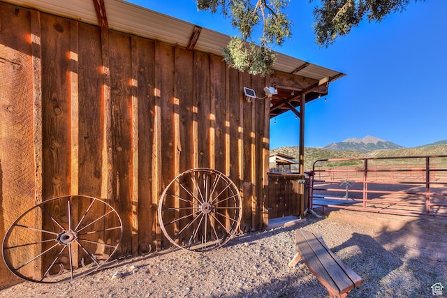 70 Desert Solitaire Rd, Moab, UT 84532 - view of yard featuring an exterior structure, a mountain view, and an outbuilding
