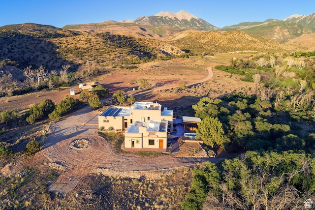 70 Desert Solitaire Rd, Moab, UT 84532 - aerial view of property and surrounding area featuring a mountainous background