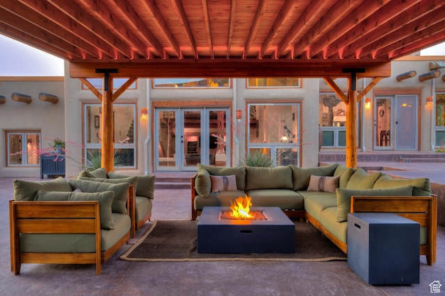 70 Desert Solitaire Rd, Moab, UT 84532 - view of patio featuring an outdoor living space with a fire pit and french doors