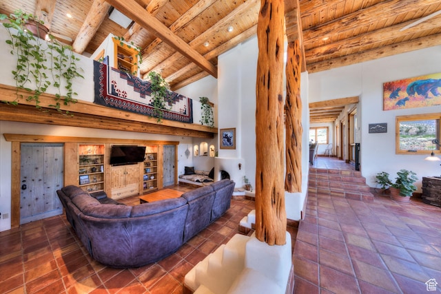 70 Desert Solitaire Rd, Moab, UT 84532 - living area featuring a wooden ceiling with exposed beams, a towering ceiling, and tile patterned floors