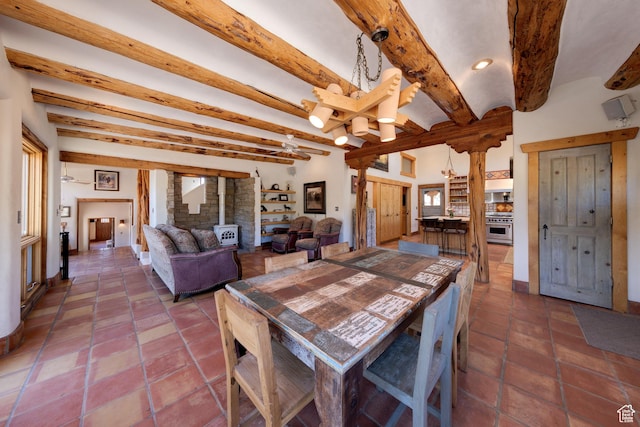 70 Desert Solitaire Rd, Moab, UT 84532 - tiled dining space with beam ceiling and ceiling fan