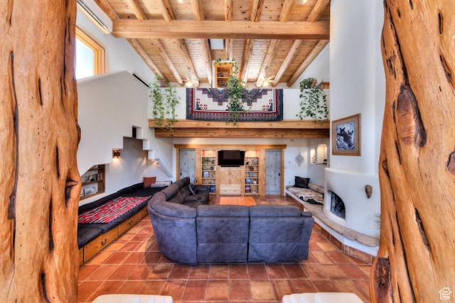 70 Desert Solitaire Rd, Moab, UT 84532 - living room with a wooden ceiling with exposed beams and a towering ceiling