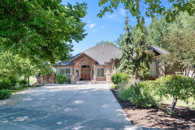 1066 W 575 N, Springville, UT 84663 - view of front of house with stone siding, driveway, and stucco siding
