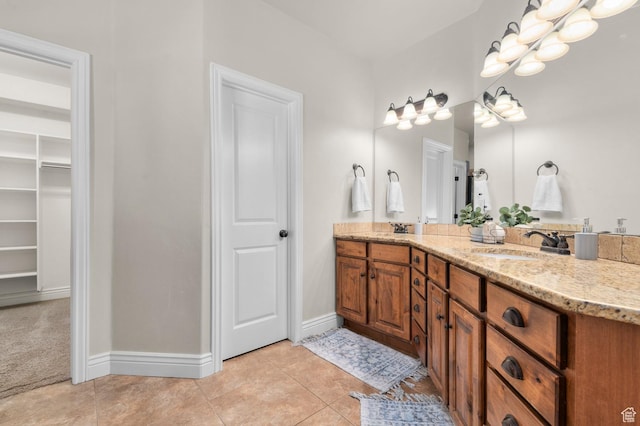 1066 W 575 N, Springville, UT 84663 - full bathroom featuring double vanity, tile patterned flooring, and a walk in closet