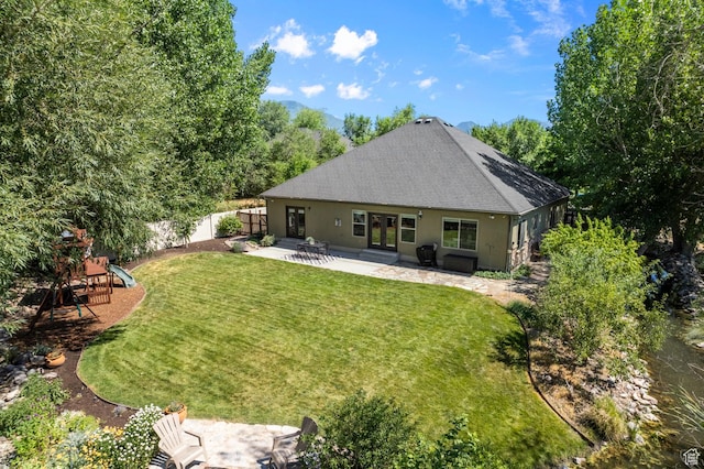 1066 W 575 N, Springville, UT 84663 - rear view of property featuring a patio, roof with shingles, and stucco siding