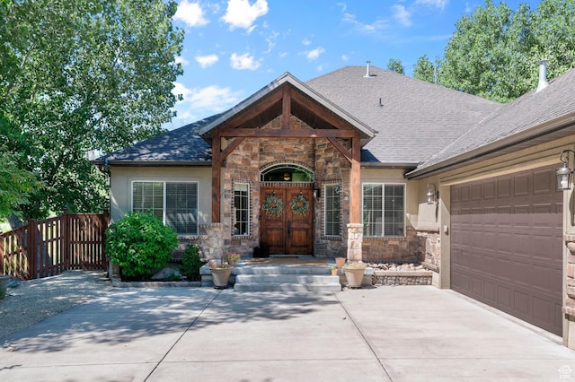 1066 W 575 N, Springville, UT 84663 - view of front of property featuring stone siding, stucco siding, and an attached garage