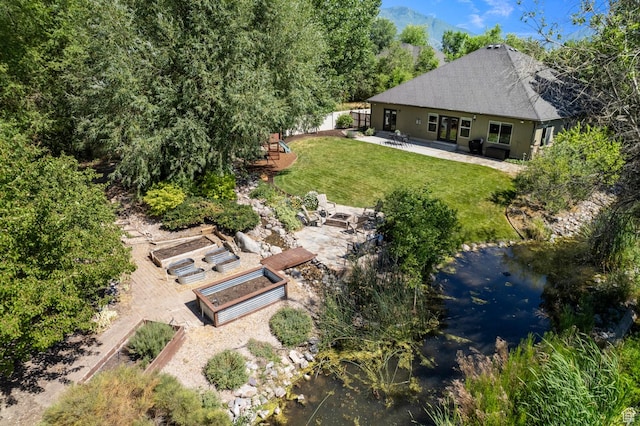 1066 W 575 N, Springville, UT 84663 - back of house with a patio and a vegetable garden