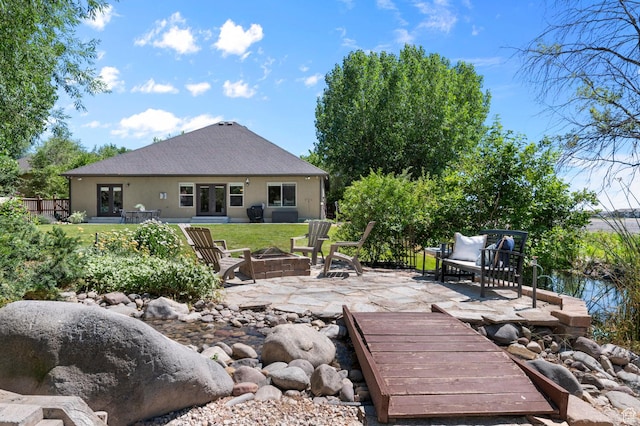 1066 W 575 N, Springville, UT 84663 - view of patio featuring french doors and an outdoor fire pit