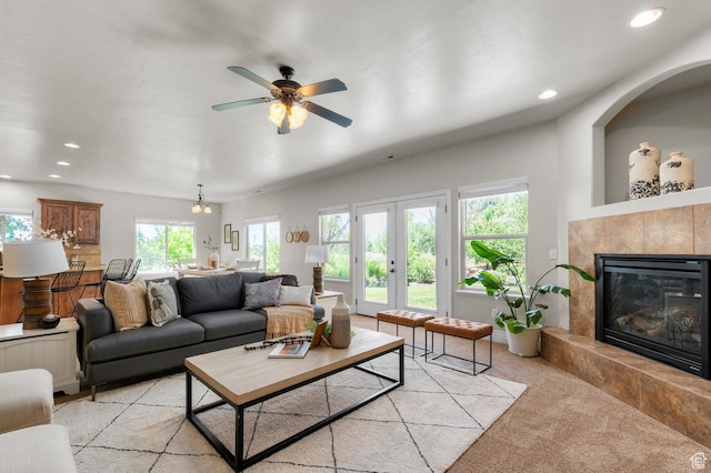 1066 W 575 N, Springville, UT 84663 - living area with light carpet, healthy amount of natural light, recessed lighting, ceiling fan, and a tile fireplace