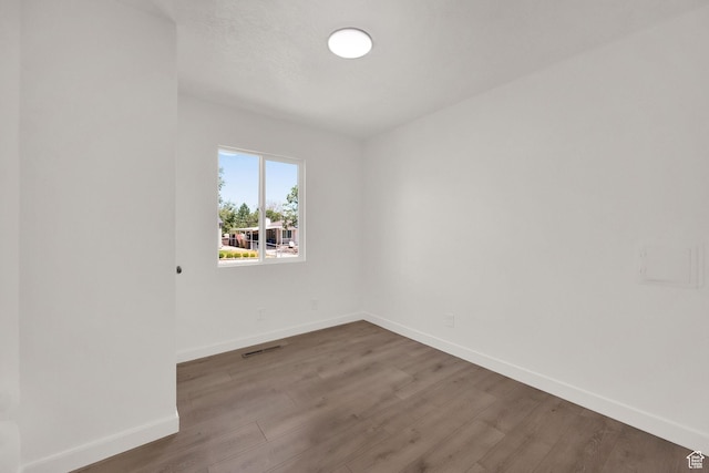 4243 W 5740 S, Salt Lake City, UT 84118 - empty room featuring wood finished floors and baseboards