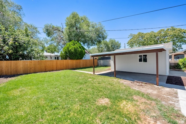4243 W 5740 S, Salt Lake City, UT 84118 - fenced backyard with a patio and an attached carport