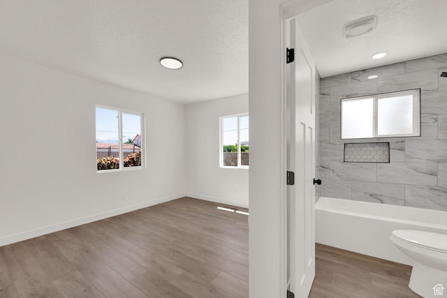 4243 W 5740 S, Salt Lake City, UT 84118 - bathroom with wood finished floors and tub / shower combination