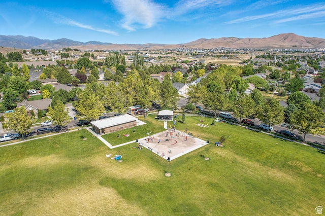7861 N Tinamous Rd, Eagle Mountain, UT 84005 - aerial view of property's location with a mountain backdrop and nearby suburban area
