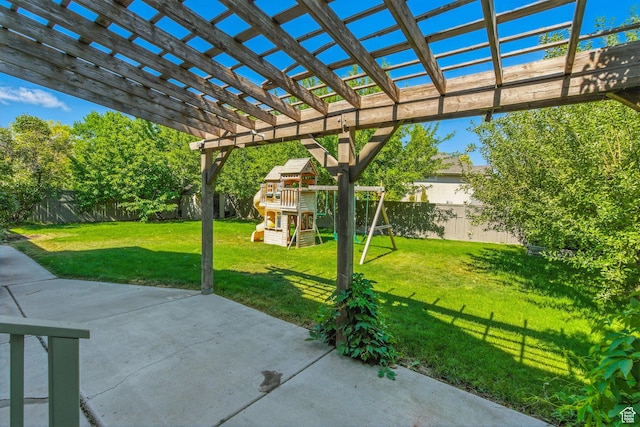 7861 N Tinamous Rd, Eagle Mountain, UT 84005 - fenced backyard featuring a playground, a patio, and a pergola