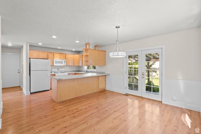 7861 N Tinamous Rd, Eagle Mountain, UT 84005 - kitchen featuring white appliances, light brown cabinets, french doors, a wainscoted wall, and light wood-style flooring