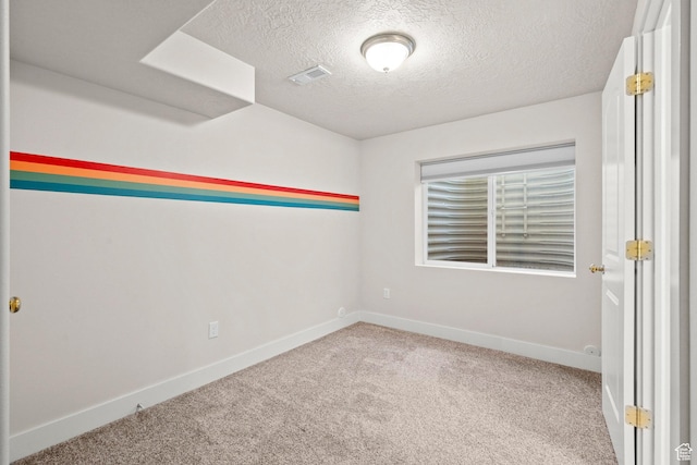 7861 N Tinamous Rd, Eagle Mountain, UT 84005 - carpeted spare room with a textured ceiling and baseboards