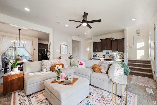 4937 W Daybreak Pkwy, South Jordan, UT 84009 - living area with a chandelier, a ceiling fan, recessed lighting, light colored carpet, and stairway