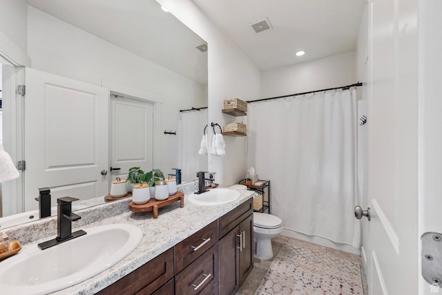 4937 W Daybreak Pkwy, South Jordan, UT 84009 - bathroom featuring double vanity, tile patterned flooring, and recessed lighting