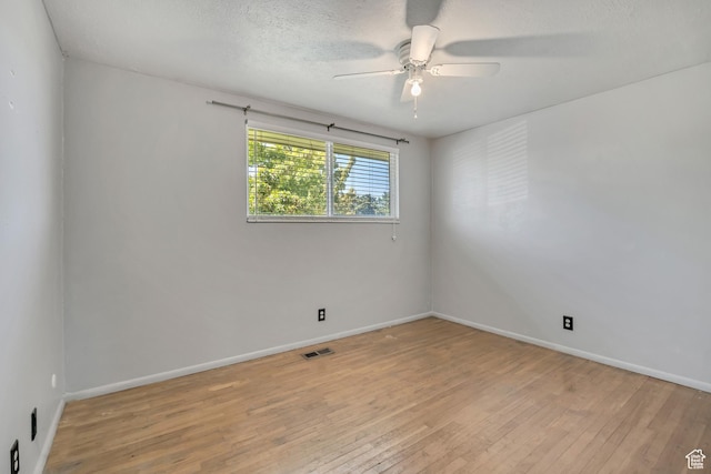 849 S 665 W, Woods Cross, UT 84087 - empty room with wood-type flooring, ceiling fan, and a textured ceiling