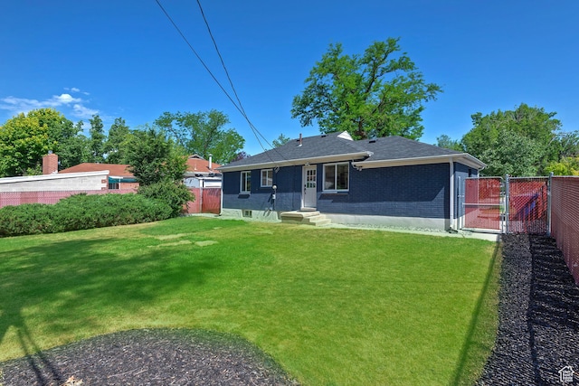 943 W Signora Dr, Salt Lake City, UT 84116 - back of property with brick siding, a gate, entry steps, and roof with shingles