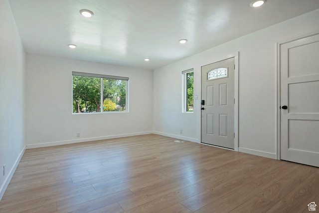 943 W Signora Dr, Salt Lake City, UT 84116 - foyer featuring light wood-style floors and recessed lighting