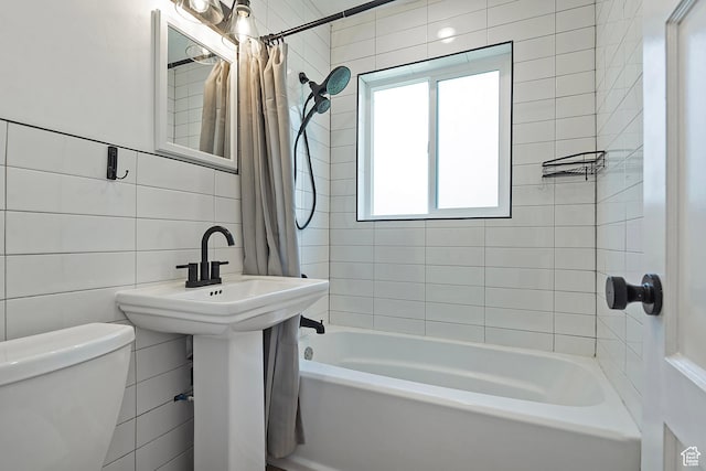 943 W Signora Dr, Salt Lake City, UT 84116 - full bathroom featuring tile walls and shower / tub combo