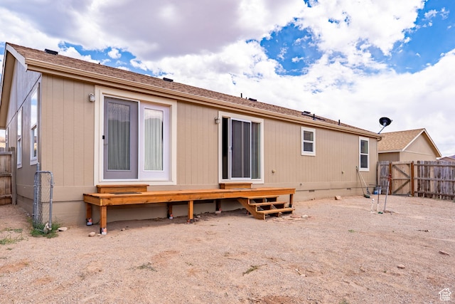 4568 Pueblo Verde Dr, Moab, UT 84532 - back of property featuring a wooden deck and crawl space