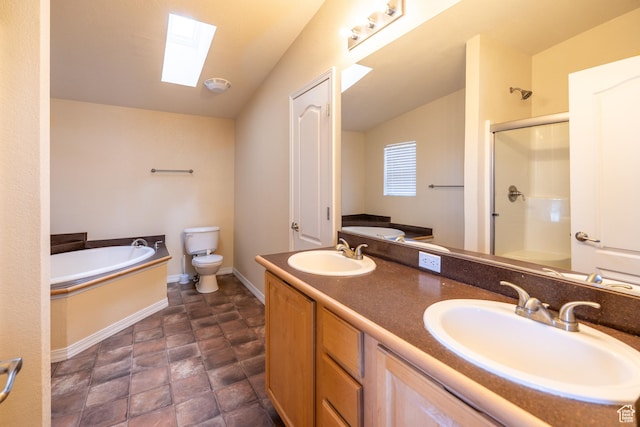 4568 Pueblo Verde Dr, Moab, UT 84532 - bathroom featuring a skylight, a garden tub, a stall shower, double vanity, and lofted ceiling