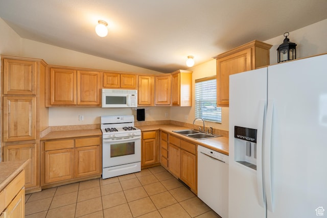 4568 Pueblo Verde Dr, Moab, UT 84532 - kitchen featuring white appliances, lofted ceiling, light countertops, light tile patterned flooring, and light brown cabinetry