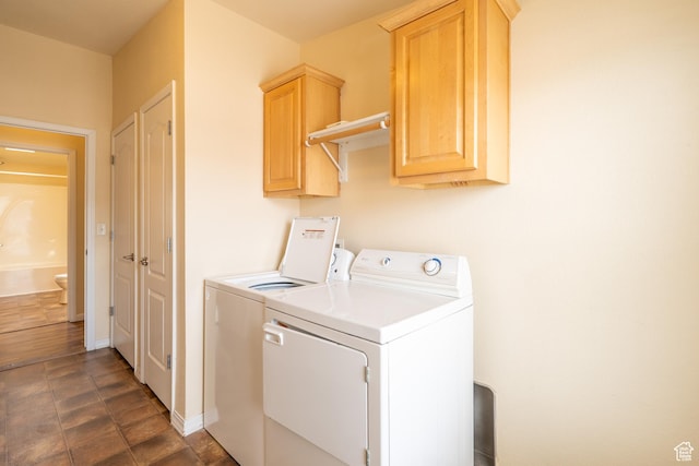 4568 Pueblo Verde Dr, Moab, UT 84532 - laundry area with washing machine and clothes dryer and cabinet space