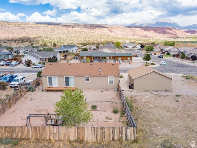 4568 Pueblo Verde Dr, Moab, UT 84532 - aerial view of residential area with a mountain backdrop