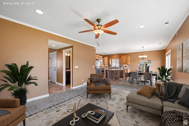 885 W 2150 N, Pleasant View, UT 84404 - living area with a ceiling fan, recessed lighting, a chandelier, and crown molding
