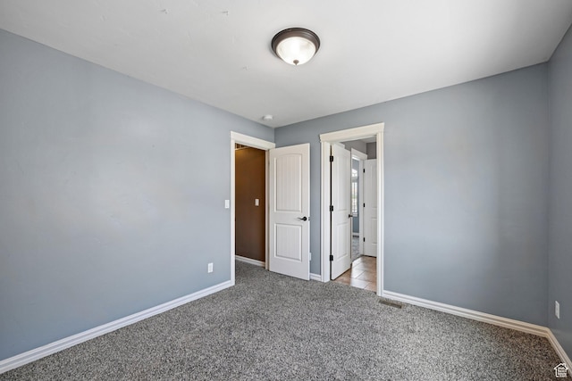 885 W 2150 N, Pleasant View, UT 84404 - unfurnished bedroom with carpet floors and baseboards
